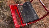 Sticker and burr removal demonstrated in a grassy area using the roller device.